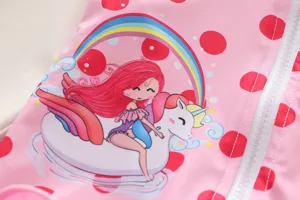 Close-up of pink girls long sleeve swimwear featuring a cute mermaid and unicorn print
