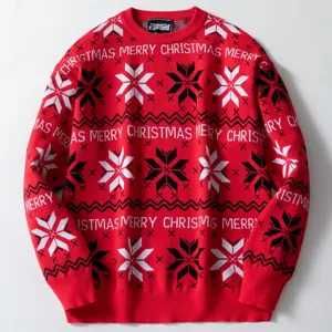 Détail d'un pull de Noël rouge en tricot avec jacquard de flocons de neige et texte