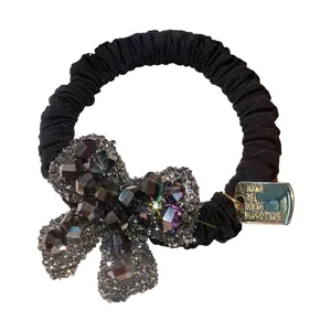Elegant crystal bow black hair tie scrunchie, premium rhinestone hair accessory main view.