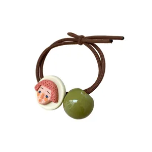 Korean ins quirky hair tie with artistic face charm and green bead, high elasticity rubber.