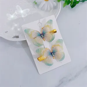 Süße Kinder Schmetterling Haarnadeln Set mit Mesh Flügeln und goldenen Entenschnabel Klammern.