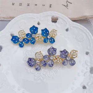 Blue and purple floral hair clips with pearls and rhinestones, elegant side hairpin.
