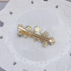 Golden flower hair clip duckbill barrette side clip for women and girls summer style detail