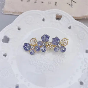 Elegant floral hairpin with sparkling rhinestones and pearls, perfect for daily styling.