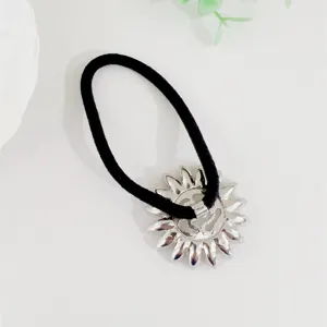 Elegant black elastic hair tie with silver tone sunflower metal charm for women daily hair styling.