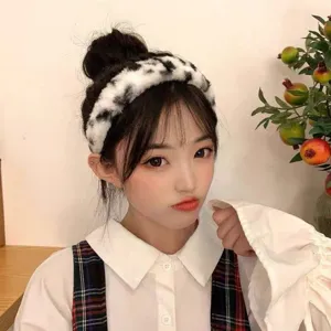 Fluffy black and white animal print headband, cozy wide brim hair hoop for women winter daily style.