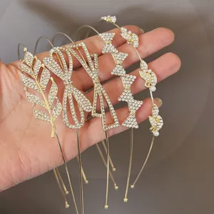 Exquisite rhinestone and pearl thin gold hair hoops detail, elegant forest style headbands.