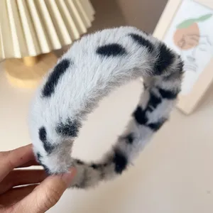 Fuzzy wide plush headband with black and white print, perfect for autumn and winter daily wear.