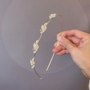 Elegant gold thin headband with sparkling rhinestones and pearls, perfect for daily wear.