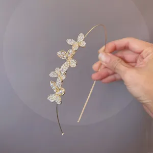 Crystal pearl butterfly headband gold thin hair hoop detail close up elegant hair accessories