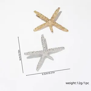 Gold and silver starfish hair clips detail shot, elegant metal side hairpins for women and girls.