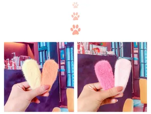 Cute large plush teardrop hair clips in sweet macaron colors, soft texture, detail view.