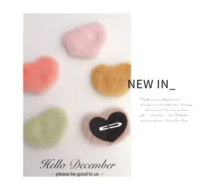 Cute plush heart hair clips in sweet candy colors, soft autumn winter fashion hair accessories.