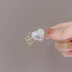 Mini heart hair claw clip rhinestone pearl hair accessory for women sweet cute styling main view