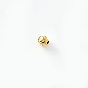 Perle d'espacement en métal doré, design côtelé pour bracelets et colliers faits à la main DIY.