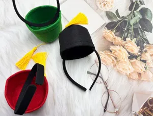 Miniature Turkish Fez hat headband with golden tassel, traditional Moroccan cosplay accessory.