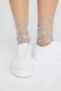 Calzini trasparenti in tulle con stelle glitterate da donna, collant alla moda per la primavera.