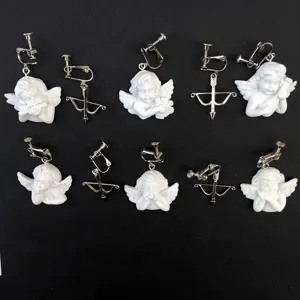 Pendientes de clip ángel cupido barrocos vintage flecha joyería detalle estilo chic cool