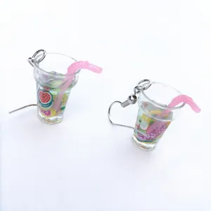 Close up detail of mini fruit juice cup earrings resin beverage food play novelty jewelry