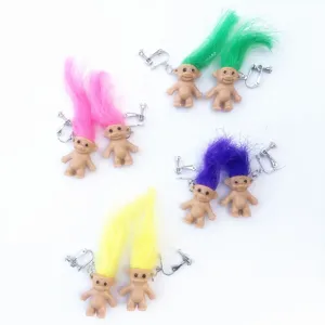 Cute vintage Trolls doll clip-on earrings with colorful hair, fun retro statement jewelry.