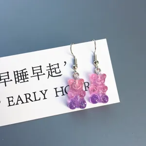 Boucles d'oreilles oursons gélifiés pailletés dégradés mignons avec crochet argenté.