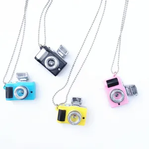Mini retro camera pendant necklace set featuring colorful vintage designs, trendy and fun fashion jewelry.
