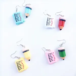 Cute handmade asymmetric pencil and test paper hook earrings, playful student style jewelry.