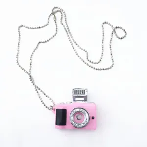 Retro pink camera pendant necklace with silver chain, trendy fashion accessory for hip-hop style.