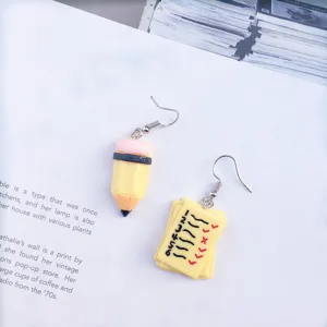 Creative handmade quirky pencil and test paper asymmetric drop earrings for students.