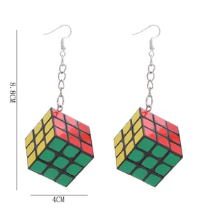 Detailed view of creative handmade Rubik's cube earrings, punk style fashion jewelry.