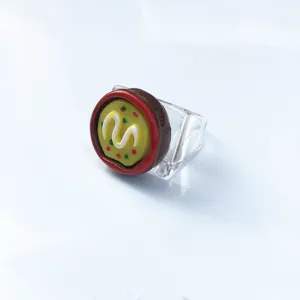 Resin acrylic chunky ring featuring a fun miniature food design on clear transparent band.