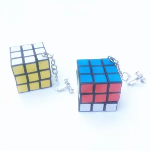 Creative handmade mini Rubik cube clip earrings, trendy punk style fashion jewelry decor.