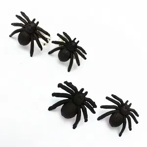 Black plastic spider rings and earrings, perfect for Halloween party decoration and fun dress up.