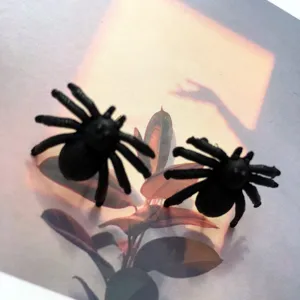 Halloween black plastic spider stud earrings detail view, perfect for party spooky styles.