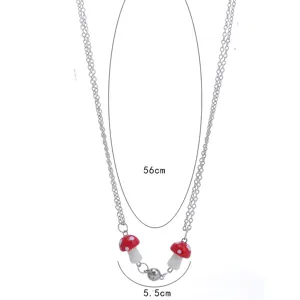Gedetailleerd overzicht van de kleurrijke paddenstoel ketting voor koppels met magnetische ketting.