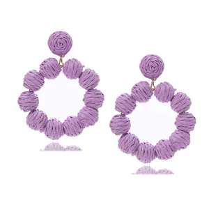 Chic purple raffia straw woven round hoop earrings for women, perfect for summer vacation.