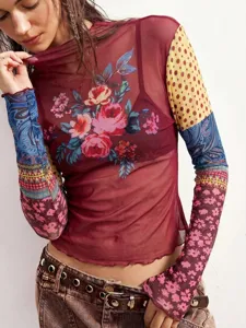 Detailed view of the autumn mesh floral printed slim top with lettuce edge long sleeves.