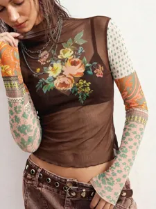 Close-up detail shot of the sheer mesh long sleeve top featuring floral print and patchwork.