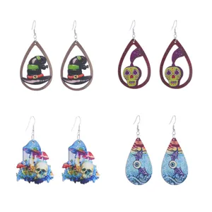 Halloween wooden drop earrings featuring spooky witch hat skull mushroom and eyeball designs.