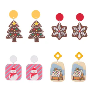 Boucles d'oreilles en acrylique de Noël avec motifs de sapin, flocon et bonhomme de neige.