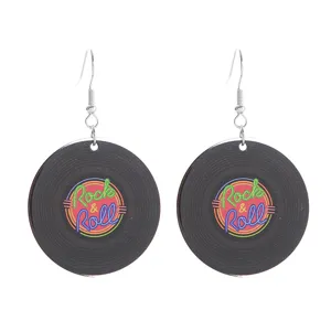 Close-up detail of retro vinyl record acrylic earrings with colorful Rock and Roll print.