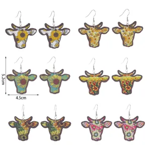 Retro Holzohrringe mit Western Cowboy Kuhkopf und wunderschönen Sonnenblumen Motiven für Sie.