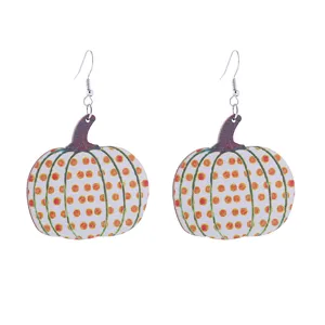 Wooden pumpkin earrings with colorful dots and metal hooks, ideal for autumn festival parties.