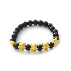 Goldene Drachen Anhänger schwarze Perlen Armband Detailansicht Tierkreis Schmuck