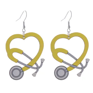 Wooden stethoscope heart earrings detail, medical theme fashion jewelry accessories for nurses.