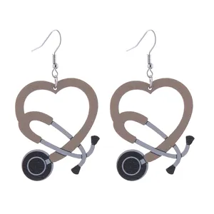 Wooden stethoscope heart earrings for nurses doctors, medical themed drop earrings detail.