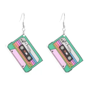 Retro cassette tape acrylic earrings detail view featuring colorful rainbow stripes design.