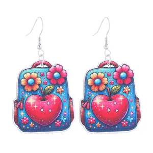 Cute cartoon backpack wooden dangle earrings with red apple design, perfect for school style.