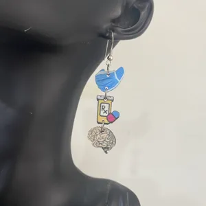 Nurse wooden dangle earrings featuring creative medical theme charms like pill bottles and brain.