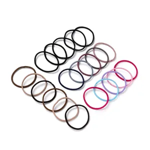 Close-up detail of assorted color elastic hair ties, soft and stretchy rubber bands for daily styling.